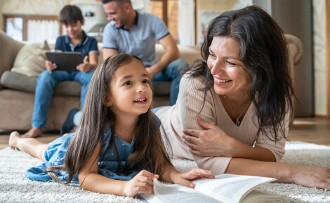 young family spending time together in a living room